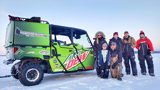 The Outdoor Bound TV Mountain Dew UTV out on the ice.