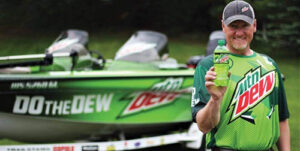 Kurt Walbeck holding a Mountain Dew Bottle
