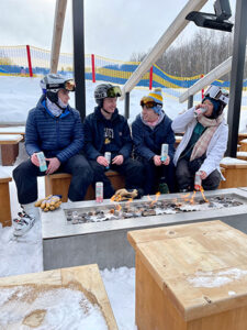 Granite-Peak-Bubblr-Tasting-6 Granite Peak Bubblr Tasting group sitting by fire