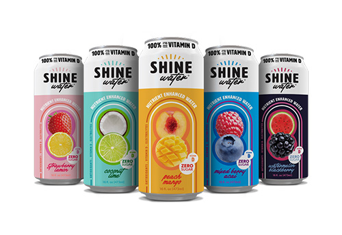 Shine Water cans in strawberry lemon, coconut lime, peach mango, mixed berry, and watermelon blackberry flavors